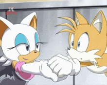 rouge-beija-tails-sonic-x.gif
