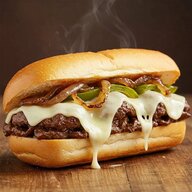Homemade_Philly_Cheese_Steak_with_melted_cheese_and_caramelized_onions_9d9e8b98-f079-48f6-89b4...jpg