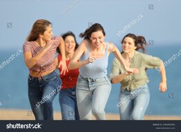 stock-photo-front-view-portrait-of-four-excited-friends-running-and-joking-on-the-beach-206694...jpg